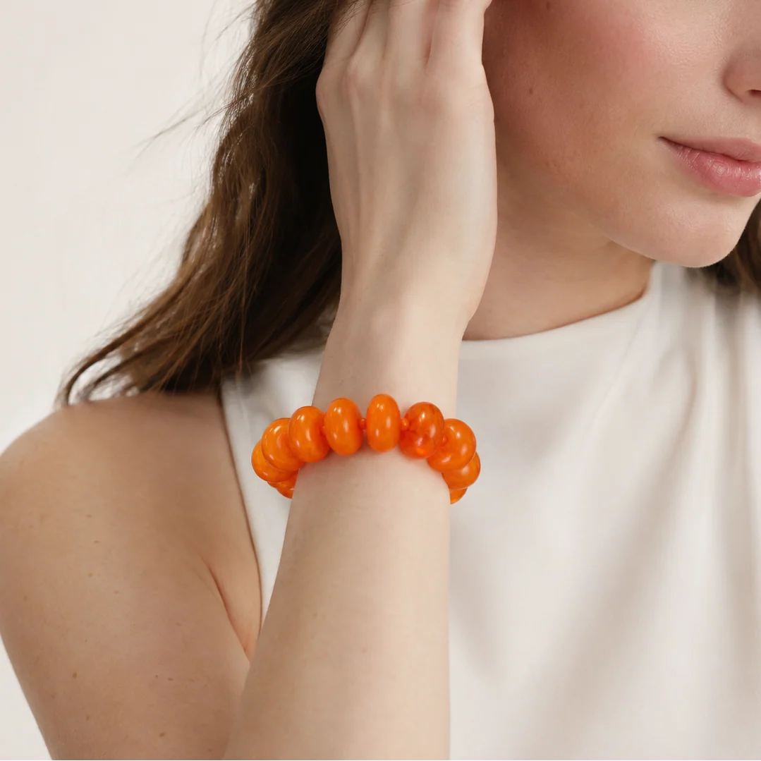 Model wearing a rondelle beaded stretch bracelet